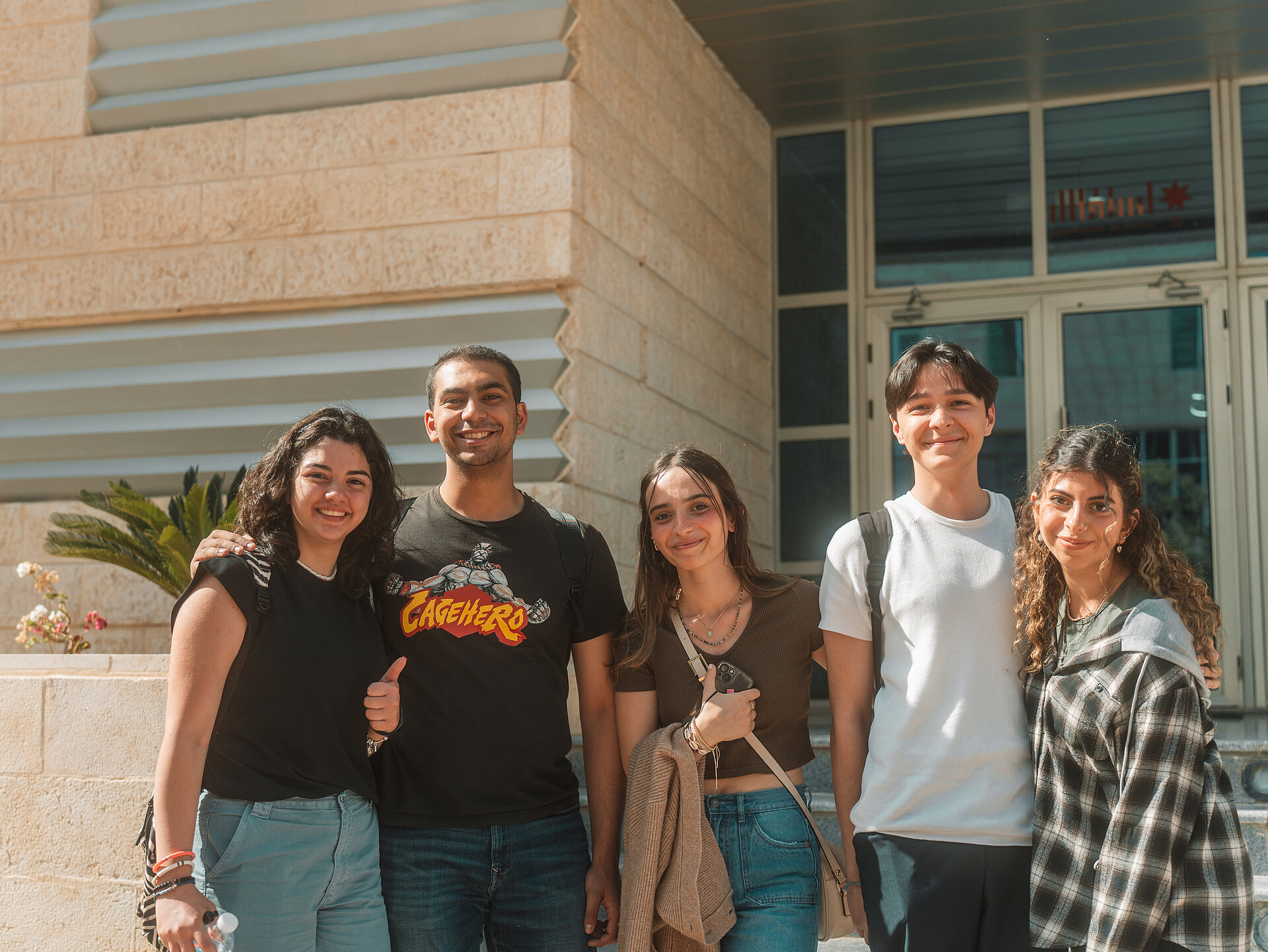 A group of students on the main GJU campus