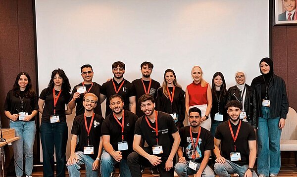 GJU German Club group picture together with Ala' Al-Turki, President of the club, and Jacqueline Rogler, Director of the German Language Center, who has been supporting this student initiative.